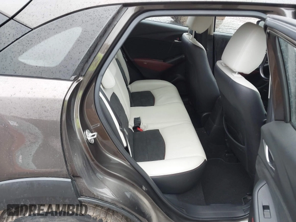 2016 Mazda CX-3 Grand Touring with VIN JM1DKBD77G0107328, listed as a IAAI auction lot 41682949 with 156,935 mi miles. Bid and sale history available at carsss.com. Image 8.