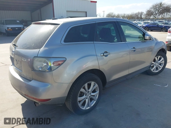 2010 Mazda CX-7 Touring z VIN JM3ER2W30A0319755, wystawiony jako IAAI lot #41786798 z przebiegiem 182 282 mil mil oraz . Historia ofert i sprzedaży dostępna na DreamBid. Obrazek 4.