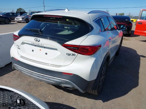 2018 Infiniti QX30 Luxury with VIN SJKCH5CR1JA005035, listed as a IAAI auction lot 41690695 with 79,943 mi miles. Bid and sale history available at carsss.com. Image 4.