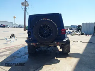 2022 Jeep Wrangler Unlimited Sahara with VIN 1C4HJXEN1NW262546, listed as a IAAI auction lot 41975925 with 17,994 mi miles and . Bid and sale history available at DreamBid. Image 17.