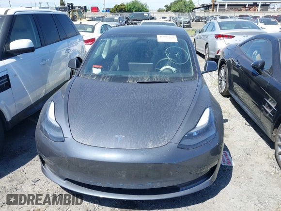 2022 Tesla Model 3 with VIN 5YJ3E1EA0NF344782, listed as a IAAI auction lot 41803469 with 16,973 mi miles and . Bid and sale history available at DreamBid. Image 12.