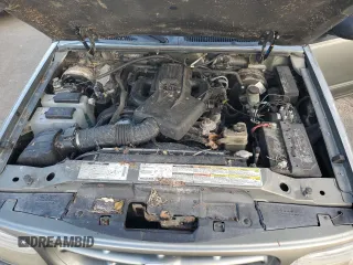 1999 Ford Explorer XLT z VIN 1FMZU34E3XZA39461, wystawiony jako Copart lot #74213774 z przebiegiem 119 937 mil mil oraz Szkoda całkowita • Salvage title. Historia ofert i sprzedaży dostępna na DreamBid. Obrazek 12.