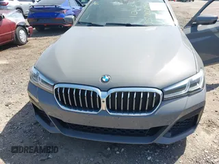 2021 BMW 5 Series 540i xDrive with VIN WBA73BJ03MWX30307, listed as a IAAI auction lot 41891615 with 27,374 mi miles and . Bid and sale history available at DreamBid. Image 6.