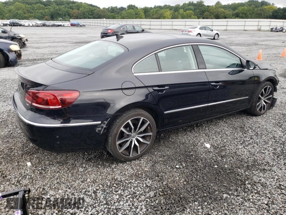 2015 Volkswagen CC Lux with VIN WVWRP7AN0FE819950, listed as a Copart auction lot 65240973 with 64,595 mi miles. Bid and sale history available at carsss.com. Image 3.