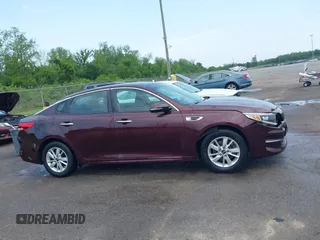 2016 Kia Optima LX with VIN 5XXGT4L32GG105361, listed as a IAAI auction lot 42066431 with 61,026 mi miles. Bid and sale history available at carsss.com. Image 13.