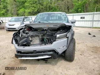 2022 Nissan Frontier Pro-4X z VIN 1N6ED1EK2NN694482, wystawiony jako Copart lot #51804515 z przebiegiem 32 288 mil mil oraz Szkoda całkowita • Salvage title. Historia ofert i sprzedaży dostępna na DreamBid. Obrazek 11.