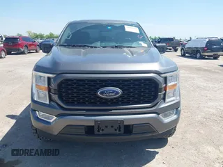 2021 Ford F-150 XL z VIN 1FTEW1CP3MKD15193, wystawiony jako IAAI lot #41984460 z przebiegiem 74 202 mil mil oraz . Historia ofert i sprzedaży dostępna na DreamBid. Obrazek 12.
