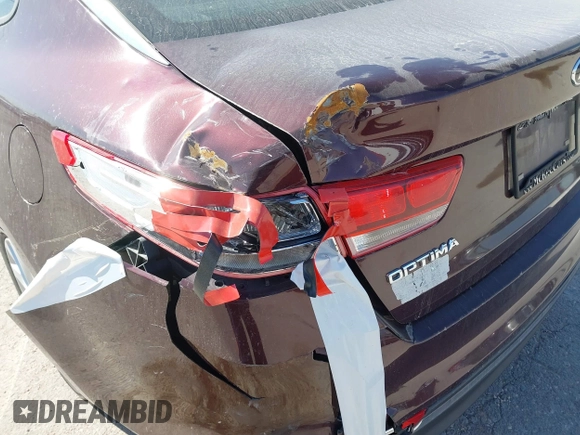 2017 Kia Optima LX with VIN 5XXGT4L33HG129749, listed as a IAAI auction lot 40360996 with 174,803 mi miles. Bid and sale history available at carsss.com. Image 6.