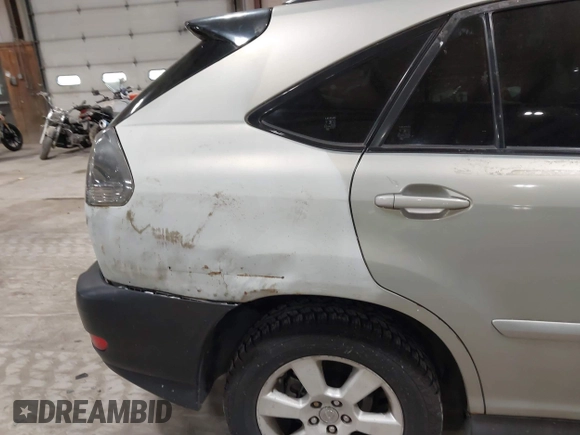 2004 Lexus RX 330 z VIN JTJHA31U640018394, wystawiony jako IAAI lot #42287633 z przebiegiem 200 999 mil mil oraz . Historia ofert i sprzedaży dostępna na DreamBid. Obrazek 13.