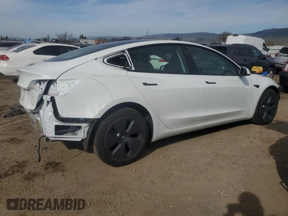2023 Tesla Model 3 with VIN 5YJ3E1EA9PF546149, listed as a Copart auction lot 52104365 with 34,105 mi miles and Salvage Title. Bid and sale history available at DreamBid. Image 3.