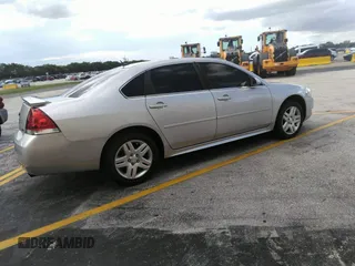 2014 Chevrolet Impala LT with VIN 2G1WB5E34E1178129, listed as a IAAI auction lot 42602823 with 132,713 mi miles and . Bid and sale history available at DreamBid. Image 4.