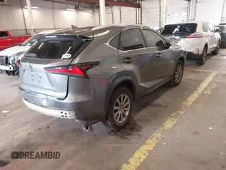 2021 Lexus NX with VIN JTJDARDZ5M2262793, listed as a IAAI auction lot 41831374 with 26,714 mi miles. Bid and sale history available at carsss.com. Image 4.
