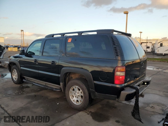 2001 Chevrolet Suburban LS z VIN 3GNFK16T91G221421, wystawiony jako Copart lot #87094634 z przebiegiem 186 977 mil mil oraz Szkoda całkowita • Salvage title. Historia ofert i sprzedaży dostępna na DreamBid. Obrazek 2.
