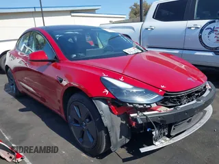 2023 Tesla Model 3 z VIN 5YJ3E1EAXPF505691, wystawiony jako IAAI lot #42454358 z przebiegiem 19 412 mil mil oraz . Historia ofert i sprzedaży dostępna na DreamBid. Obrazek 1.