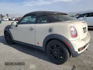 2013 MINI Coupe S z VIN WMWSX3C55DT772606, wystawiony jako Copart lot #43653845 z przebiegiem 39 474 mil mil oraz Czysty tytuł • Clean title. Historia ofert i sprzedaży dostępna na DreamBid. Obrazek 2.