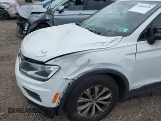 2019 Volkswagen Tiguan S z VIN 3VV0B7AX9KM055305, wystawiony jako IAAI lot #42160128 z przebiegiem 67 826 mil mil oraz . Historia ofert i sprzedaży dostępna na DreamBid. Obrazek 17.