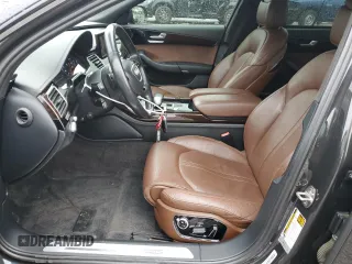 2017 Audi A8 z VIN WAU44AFD0HN004258, wystawiony jako Copart lot #55283985 z przebiegiem 128 059 mil mil oraz Szkoda całkowita • Salvage title. Historia ofert i sprzedaży dostępna na DreamBid. Obrazek 7.