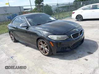 2014 BMW 2 Series M235i with VIN WBA1J7C50EVW84072, listed as a IAAI auction lot 41917841 with 102,745 mi miles and . Bid and sale history available at carsss.com. Image 1.