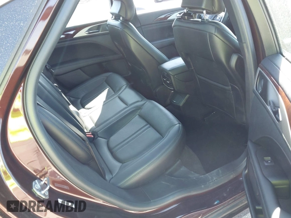 2019 Lincoln MKZ Reserve II z VIN 3LN6L5E99KR623668, wystawiony jako IAAI lot #41822730 z przebiegiem 13 609 mil mil oraz . Historia ofert i sprzedaży dostępna na DreamBid. Obrazek 8.