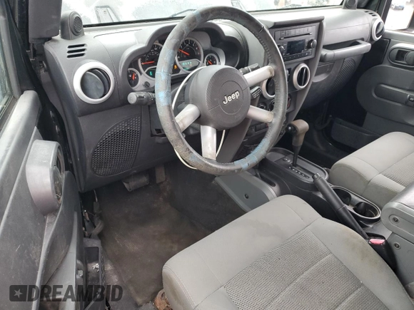 2009 Jeep Wrangler Sahara with VIN 1J4FA54109L702963, listed as a Copart auction lot 89211555 with 125,138 mi miles and Clean title. Bid and sale history available at DreamBid. Image 8.