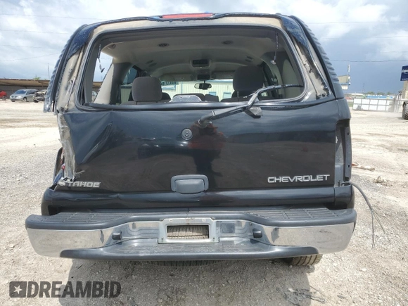 2004 Chevrolet Tahoe LT with VIN 1GNEC13Z04R200222, listed as a Copart auction lot 64813184 with 219,805 mi miles and Clean Title. Bid and sale history available at carsss.com. Image 6.