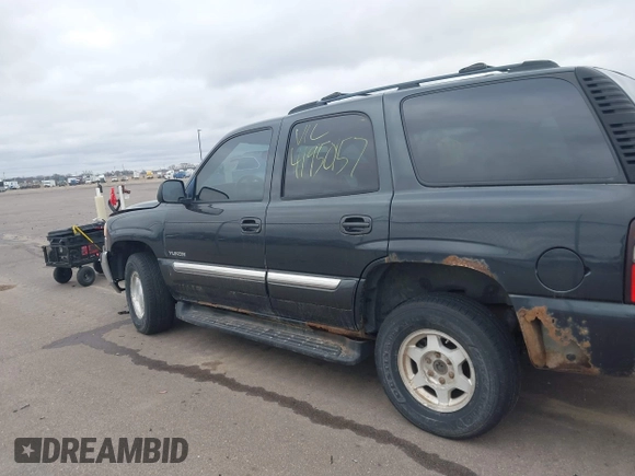 2004 GMC Yukon SLT with VIN 1GKEK13Z24J113954, listed as a IAAI auction lot 41950157 with 174,021 mi miles. Bid and sale history available at carsss.com. Image 15.