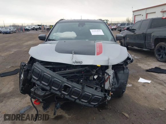 2022 Jeep Compass Trailhawk with VIN 3C4NJDDB3NT128118, listed as a IAAI auction lot 41664845 with 32,660 mi miles and . Bid and sale history available at DreamBid. Image 12.