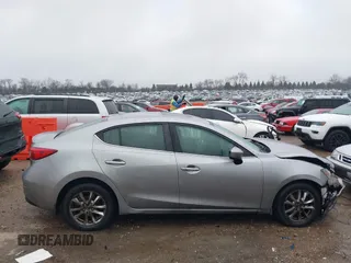 2016 Mazda 3 i Grand Touring z VIN 3MZBM1X74GM245295, wystawiony jako IAAI lot #41079843 z przebiegiem 183 480 mil mil oraz . Historia ofert i sprzedaży dostępna na DreamBid. Obrazek 13.