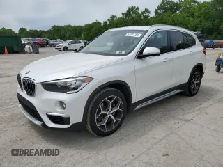 2018 BMW X1 xDrive28i z VIN WBXHT3C34J3H30422, wystawiony jako Copart lot #57701765 z przebiegiem 120 745 mil mil oraz Szkoda całkowita • Salvage title. Historia ofert i sprzedaży dostępna na DreamBid. Obrazek 1.
