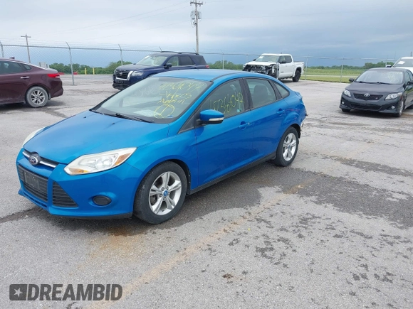 2013 Ford Focus SE with VIN 1FADP3F27DL142539, listed as a IAAI auction lot 42364047 with 103,153 mi miles and . Bid and sale history available at DreamBid. Image 2.