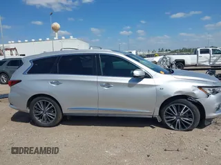 2019 Infiniti QX60 LUXE with VIN 5N1DL0MN8KC526839, listed as a IAAI auction lot 41811271 with 83,729 mi miles. Bid and sale history available at carsss.com. Image 13.