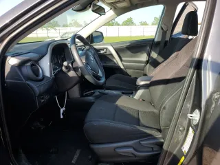 2018 Toyota RAV4 XLE with VIN 2T3WFREV0JW517488, listed as a Copart auction lot 51000975 with 68,105 mi miles and Salvage title. Bid and sale history available at DreamBid. Image 7.