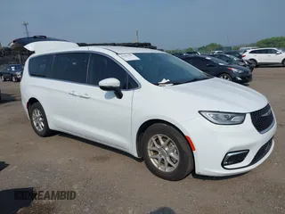 2023 Chrysler Pacifica Touring L with VIN 2C4RC1BGXPR509365, listed as a IAAI auction lot 42493207 with 17,442 mi miles and . Bid and sale history available at DreamBid. Image 1.