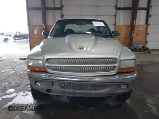 2004 Dodge Dakota SLT with VIN 1D7HG48N64S523528, listed as a IAAI auction lot 41199575 with 261,239 mi miles. Bid and sale history available at carsss.com. Image 12.