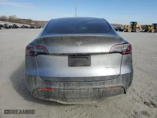 2025 Tesla Model Y Long Range with VIN 7SAYGDEE7SA345606, listed as a Copart auction lot 88669765 with 0 mi miles and Salvage Title. Bid and sale history available at carsss.com. Image 6.