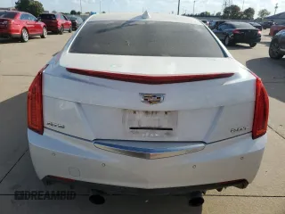 2015 Cadillac ATS Premium with VIN 1G6AE5SX4F0133210, listed as a Copart auction lot 77027604 with 80,682 mi miles and Salvage Title. Bid and sale history available at carsss.com. Image 6.