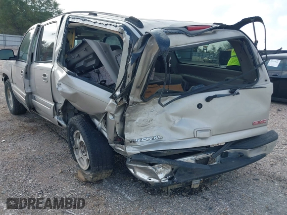 2004 GMC Yukon XL SLT with VIN 3GKEC16Z64G292509, listed as a IAAI auction lot 40948787 with 143,099 mi miles. Bid and sale history available at carsss.com. Image 3.