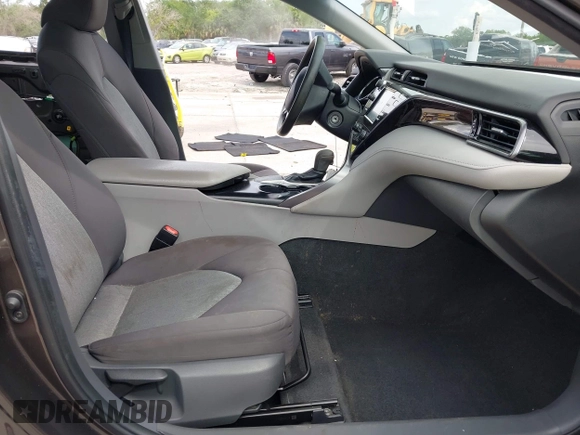 2019 Toyota Camry LE with VIN 4T1B11HKXKU818442, listed as a IAAI auction lot 41906128 with 30,728 mi miles and . Bid and sale history available at DreamBid. Image 5.