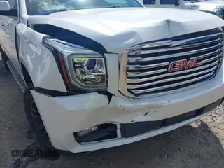 2017 GMC Yukon XL SLT z VIN 1GKS2GKC5HR160468, wystawiony jako IAAI lot #42166908 z przebiegiem 131 469 mil mil oraz . Historia ofert i sprzedaży dostępna na DreamBid. Obrazek 6.