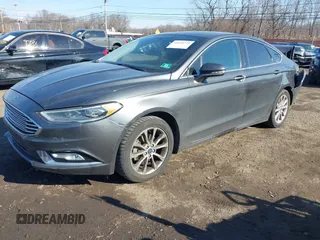 2017 Ford Fusion SE z VIN 3FA6P0HDXHR321008, wystawiony jako IAAI lot #41620779 z przebiegiem 110 116 mil mil oraz . Historia ofert i sprzedaży dostępna na DreamBid. Obrazek 2.