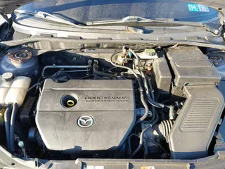 2008 Mazda 3 i Touring Value with VIN JM1BK32G181149702, listed as a IAAI auction lot 41800136 with 205,677 mi miles. Bid and sale history available at carsss.com. Image 10.