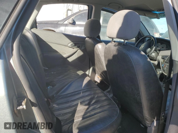 2003 Ford Focus ZTS with VIN 1FAFP38393W115936, listed as a Copart auction lot 42598715 with 100,610 mi miles and Salvage Title. Bid and sale history available at carsss.com. Image 10.