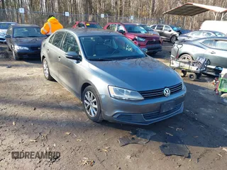 2014 Volkswagen Jetta Sedan SE w/Connectivity/Sunroof PZEV with VIN 3VWD17AJ7EM241974, listed as a IAAI auction lot 41223173 with 142,908 mi miles. Bid and sale history available at carsss.com. Image 1.