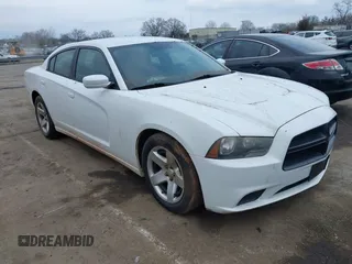 2013 Dodge Charger Police with VIN 2C3CDXAT8DH555397, listed as a IAAI auction lot 41487802 with 117,577 mi miles. Bid and sale history available at carsss.com. Image 1.