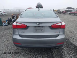 2014 Kia Forte EX with VIN KNAFX4A8XE5213014, listed as a IAAI auction lot 41000589 with 89,890 mi miles. Bid and sale history available at carsss.com. Image 16.