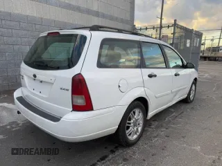 2005 Ford Focus SE with VIN 1FAFP36N65W234695, listed as a Copart auction lot 50022715 with 128,583 mi miles and Clean Title. Bid and sale history available at carsss.com. Image 4.