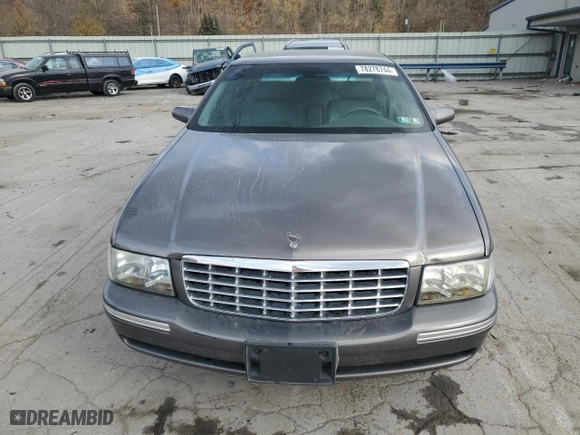 1999 Cadillac DeVille with VIN 1G6KD54Y0XU767170, listed as a Copart auction lot 78278744 with 63,063 mi miles and Salvage Title. Bid and sale history available at carsss.com. Image 5.