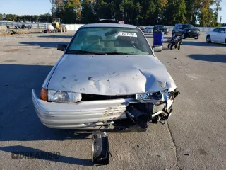 1995 Ford Escort z VIN 3FASP13J0SR159107, wystawiony jako Copart lot #76715394 z przebiegiem 353 430 mil mil oraz Szkody całkowita. Historia ofert i sprzedaży dostępna na DreamBid. Obrazek 5.