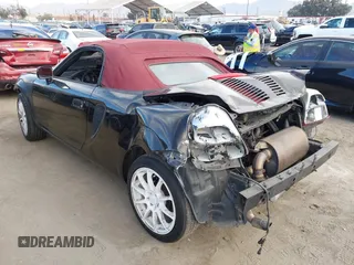 2001 Toyota MR2 z VIN JTDFR320710035330, wystawiony jako IAAI lot #41238516 z przebiegiem 160 405 mil mil oraz . Historia ofert i sprzedaży dostępna na DreamBid. Obrazek 3.