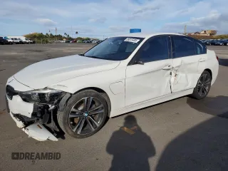 2018 BMW 3 Series 330e iPerformance with VIN WBA8E1C52JA756990, listed as a Copart auction lot 88815495 with 64,081 mi miles and Non Repairable. Bid and sale history available at carsss.com. Image 1.